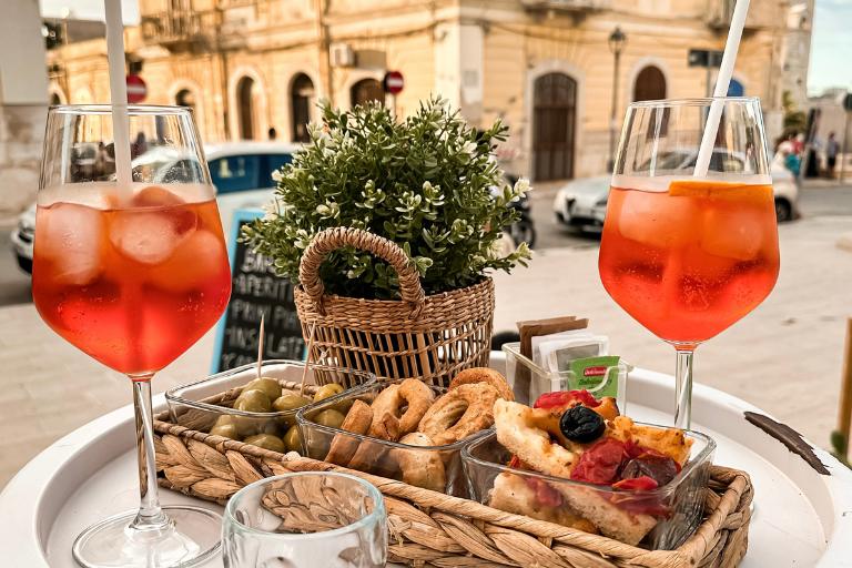 Italy Travel Tips 4 aperol spritz with snacks