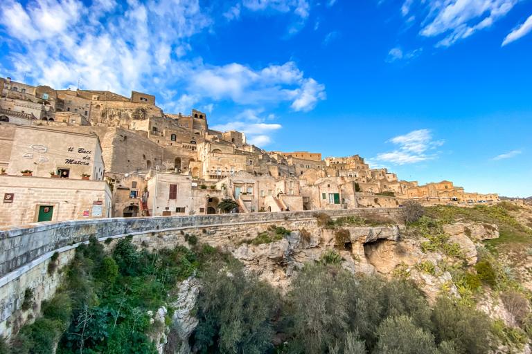 Cave homes in Matera lining the road