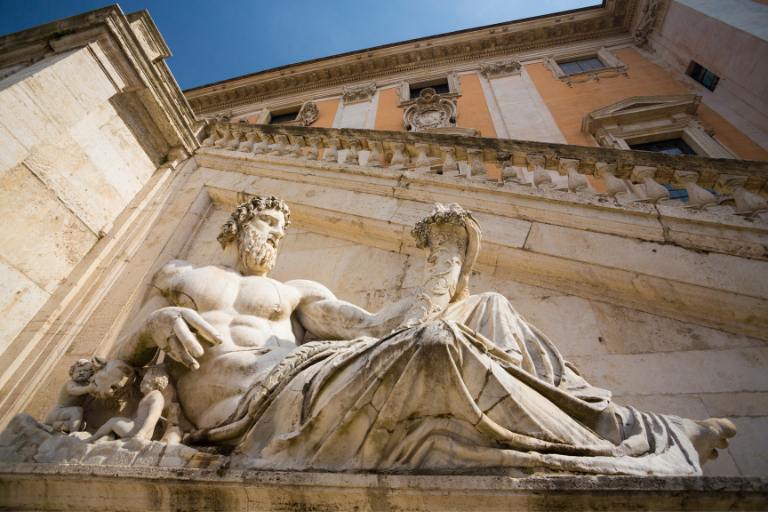 a statue of a man lying down